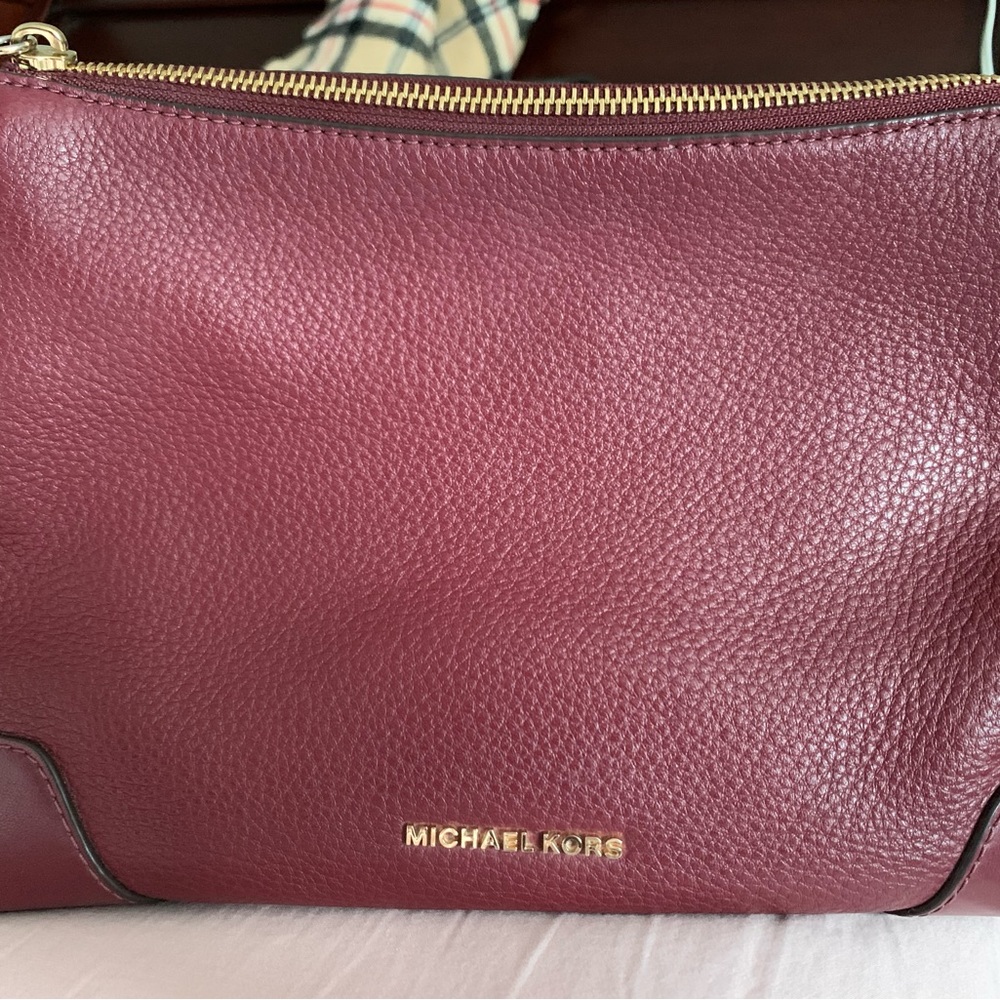 MAKE AN OFFER 
Micheal Kors Burgandy handbag
